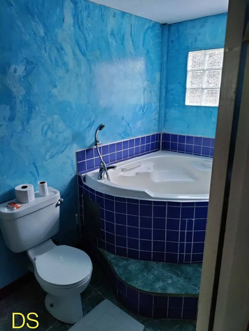 Bathroom with corner tub
